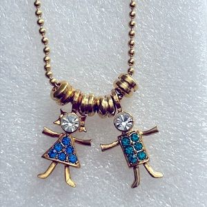 K.L.S gold tone blue/green/clear ringtone necklace with boy and girl New